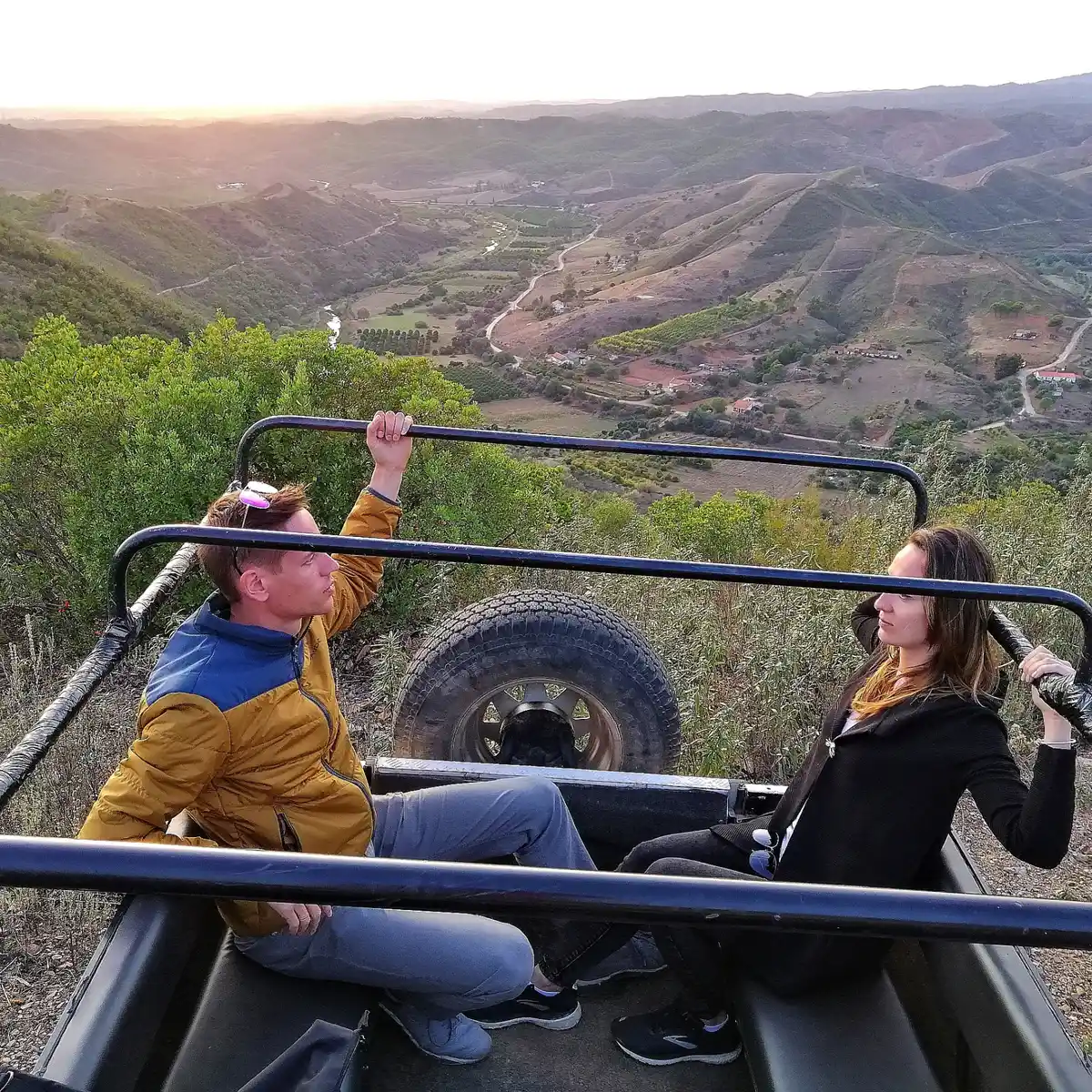 Guests in an open Portuguese jeep above the Silves hills